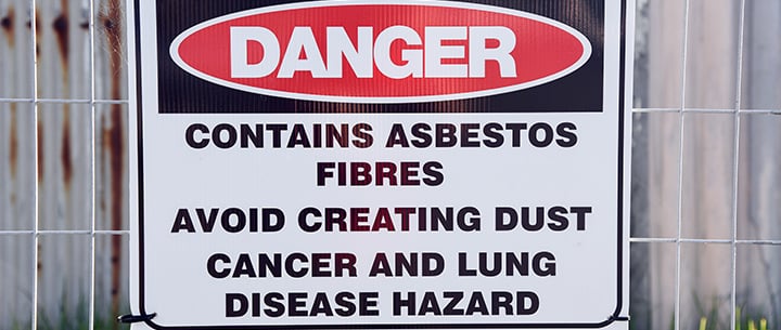 Danger sign warning about asbestos fibres and Asbestosis risk