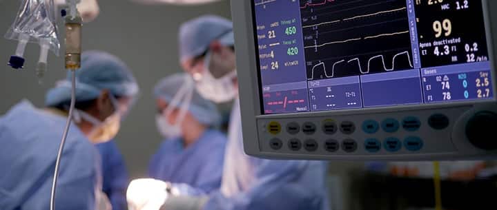 doctors performing surgery