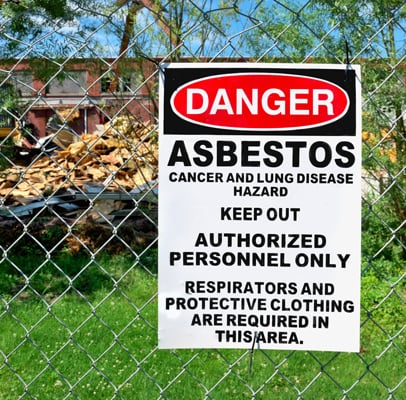 Danger asbestos sign warning about hidden risks from Asbestos Industry Cover-ups