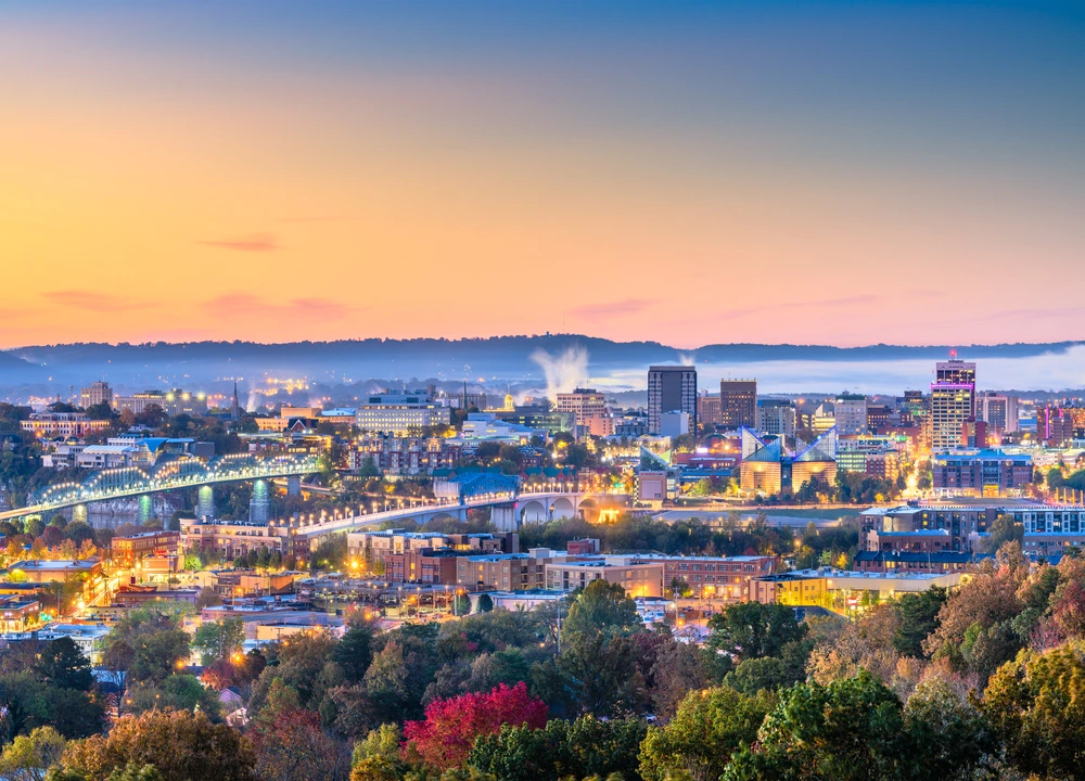 A picturesque sunset over Charleston, SC, highlighting the city's historic architecture and vibrant skyline