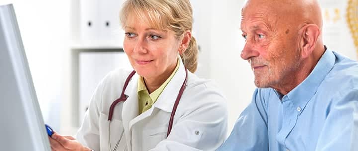 doctor talking with patient