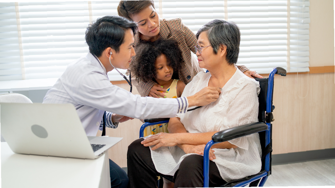 Elderly woman receiving a lung check-up with her daughter and granddaughter by her side