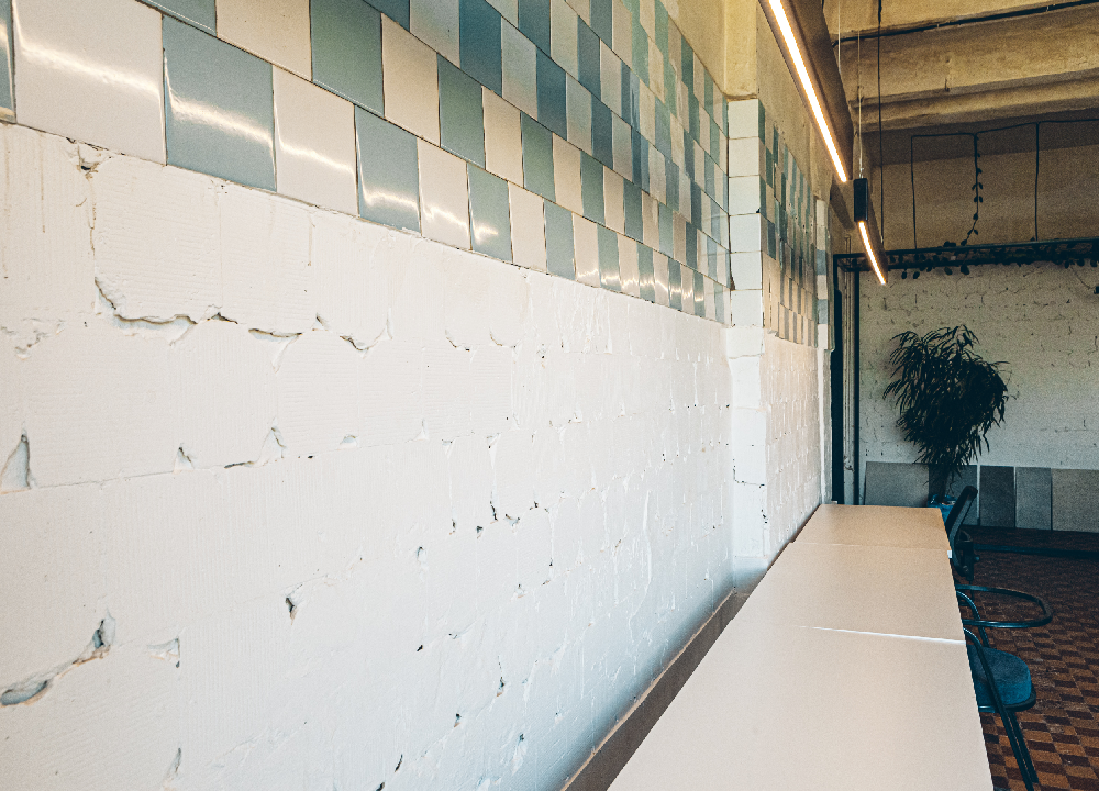 Cracked walls in an old school classroom