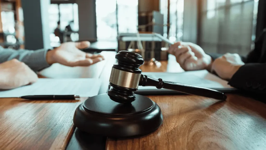 Legal files and gavel representing Largest Asbestos Lawsuit Settlements in California.