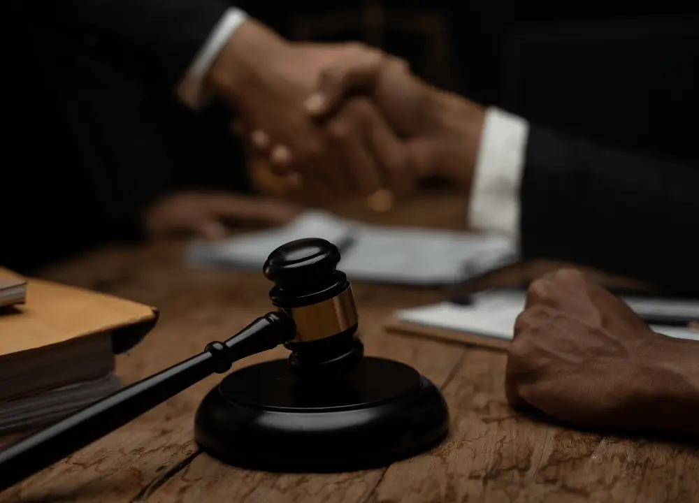 Courtroom and industrial worker imagery representing the Shook & Fletcher Asbestos Lawsuit and bankruptcy trust.