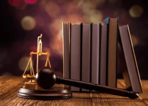 Justice/legal concept photo gavel + folder labeled